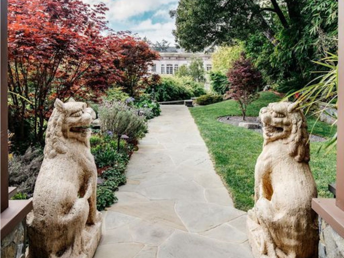 A pair of Chinese Guardian Lions greet guests at the front porch.