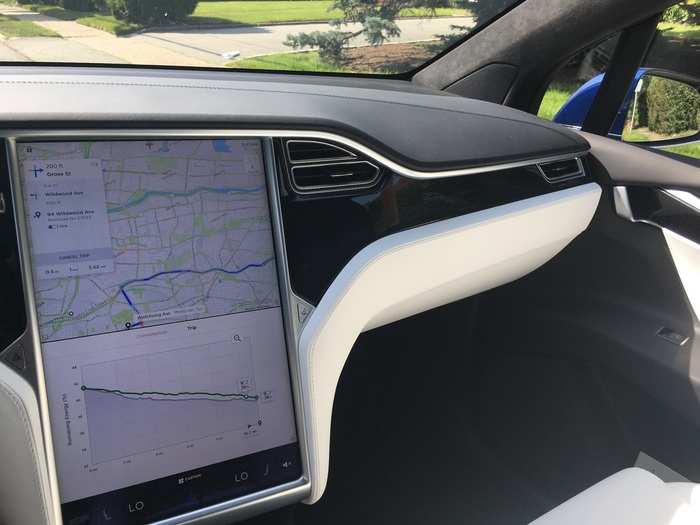 Inside, our Model X was decked out in white leather, dark ash wood, and black Alcantara. There