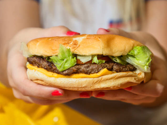 But what about the burger? According to company lore, founder Harmon Dobson wanted to create a five-inch burger that was so big people couldn