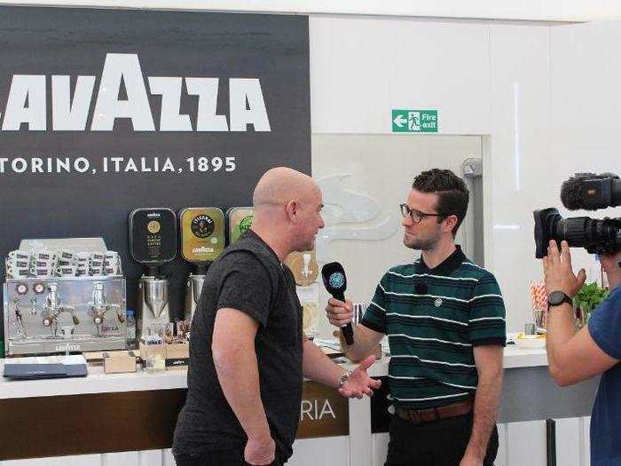 Andre Agassi was conducting a TV interview when I entered the Lavazza VIP booth.