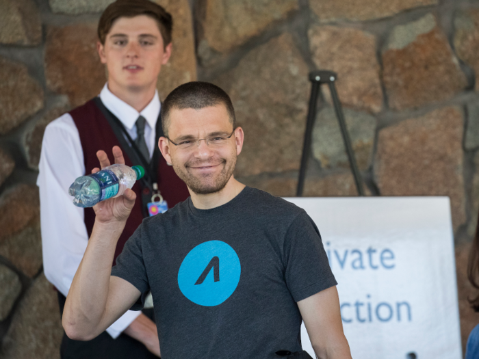 Max Levchin, co-founder of PayPal and CEO of financial technology company Affirm, gives a wave.