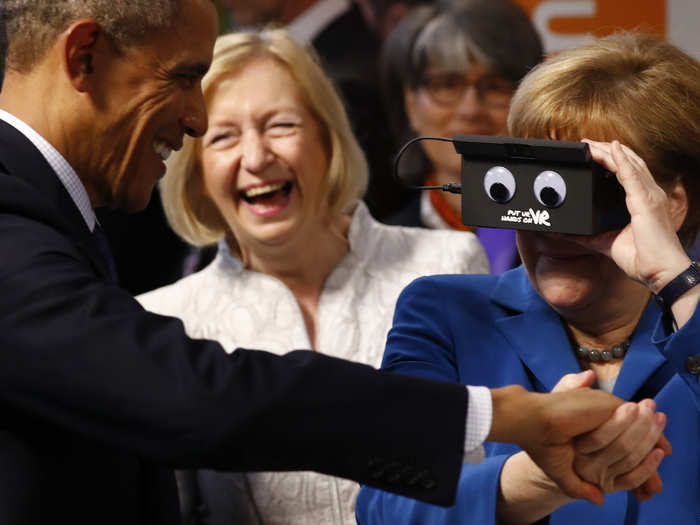 In contrast, Obama and Merkel were able to have fun at their international summits. Here, they experience a virtual reality headset in a diplomatic meeting in Hannover, Germany.