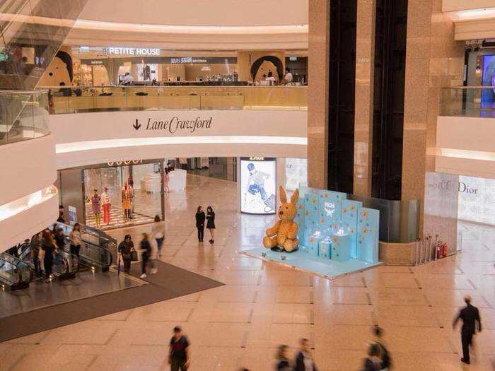 Times Square mall in Hong Kong has 14 floors plus two basement levels. It has over 230 stores and is anchored by a two-floor Lane Crawford.