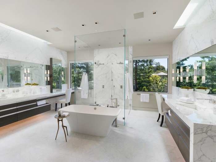 As well as four half bathrooms and eight full ones, one of which sports a heavenly white tub.