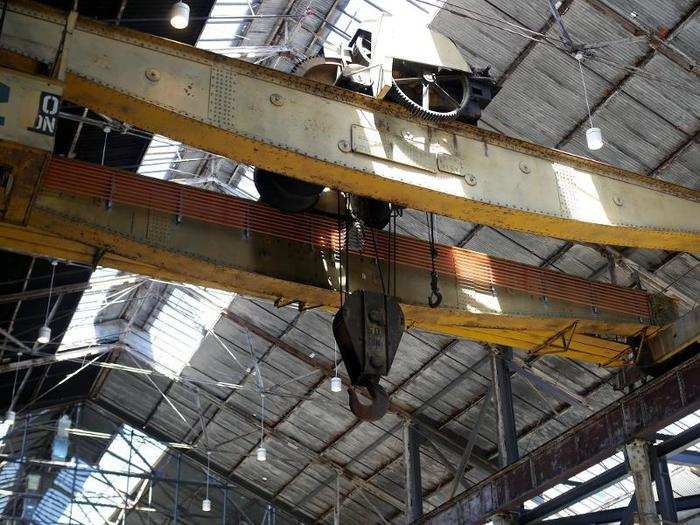 Gusto preserved as much of the original architecture as it could, including the pipes and beams and old gantry cranes overhead.