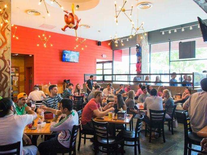 Before noon, the restaurant was already packed. Hungover college students were inhaling tacos alongside families and World Cup fans sipping beers.