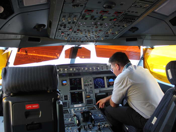 Up front is a modern glass cockpit.