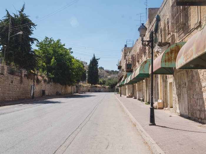 There was no street life in H2. It was eerily silent. The IDF has called the area "tzir sterili," or sterile roads.