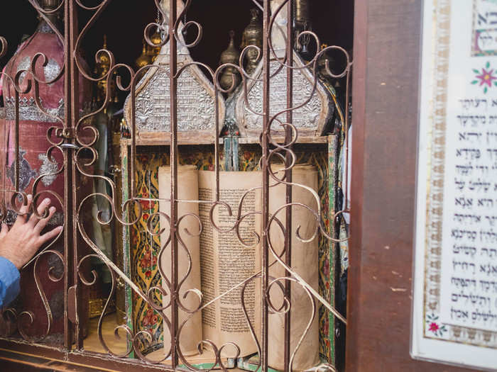 Israeli settlers point to the synagogue as proof that there was a Jewish presence in Hebron for centuries. The synagogue was abandoned after the massacre and was turned into a goat shed during Jordanian rule. In the 1970s, Noam Arnon, an Israeli, rebuilt it. The synagogue still has the original centuries-old Torah scrolls, thanks to a Jewish boy who rescued them on the eve of the 1929 massacre.