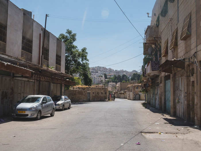 After leaving the temple, we headed out into H2, the Israeli-controlled part of the city. Jews began settling in the city as early as 1968, but the community only has about 1,000 people and takes up a handful of buildings — about 3% of the city. The area, which is mostly off-limits to Palestinians who don