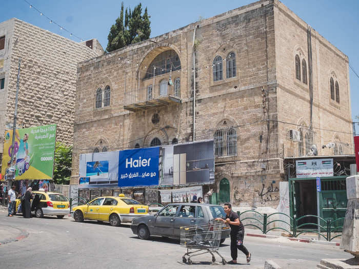 Al-Mohtaseb said that Hebronites believe Israelis have three main goals for Hebron: settle in the city center; build up a route between that settlement and another settlement called Kiryat Arba; and convert the Palestinian homes in-between to Israeli homes.