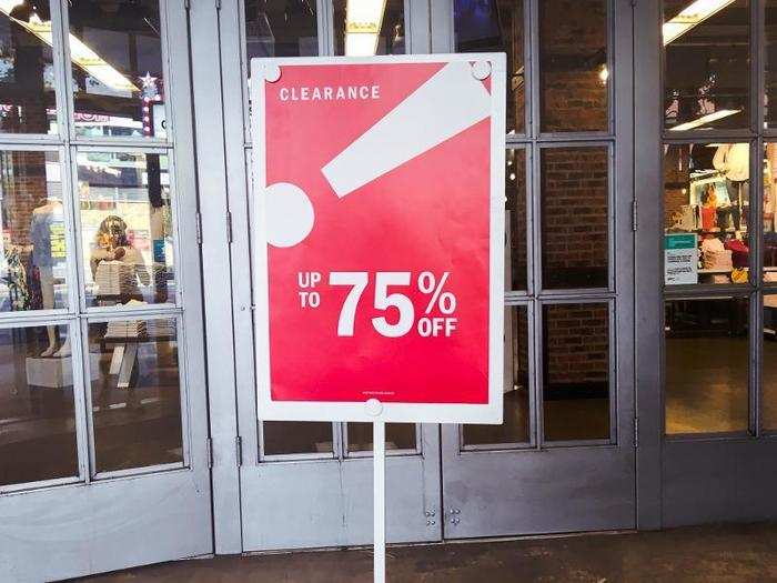 In the doorway was a big red "clearance" sign advertising up to 75% off.