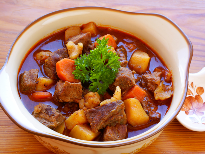 Goulash is a Hungarian stew consisting of meat, potatoes, and a healthy dose of paprika.