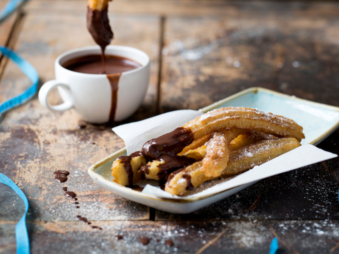 Churros con chocolate are done right in Spain, where they