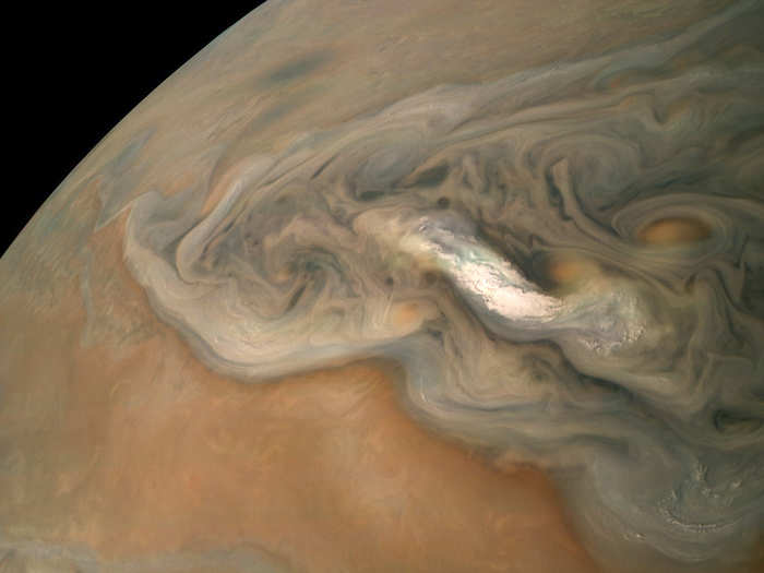 But Jupiter has plenty of other remarkable cloudscapes and storms swirling. This swath of high-altitude clouds is located in the planet