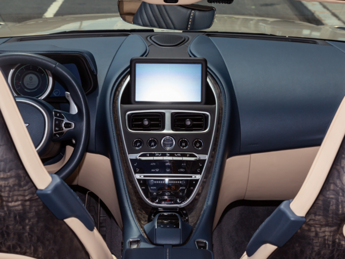 The gearshifts are handled by buttons in the center stack, and an 8-speed transmission can be manually operated using paddles behind the steering wheel.