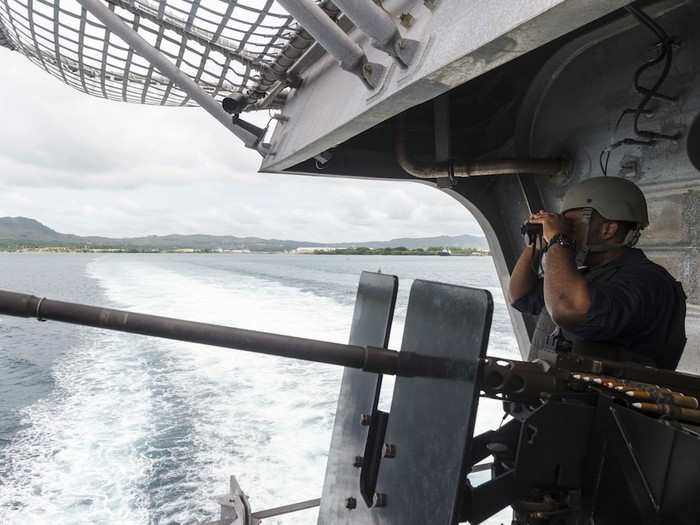 50-calibre machine guns on the port and starboard walkways and on the stern underneath the flight deck.