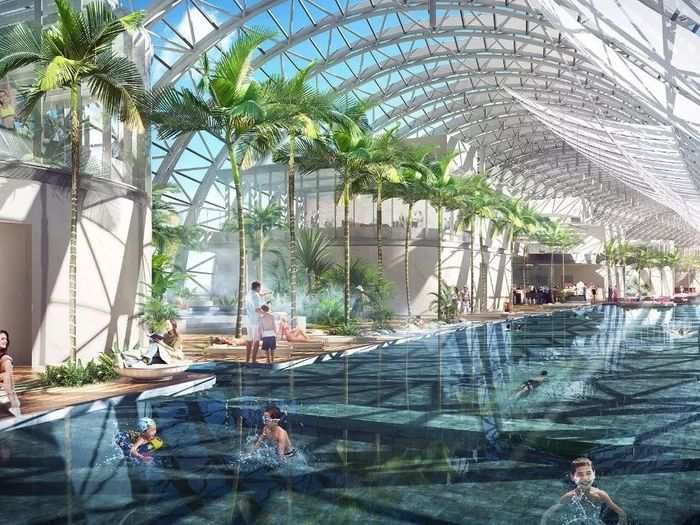 Called the Conservatory, the cylindrical structure will house a giant swimming pool, observatory deck, and retail.