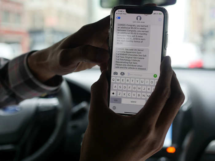 The Uber driver will receive a notification on their phone when a passenger