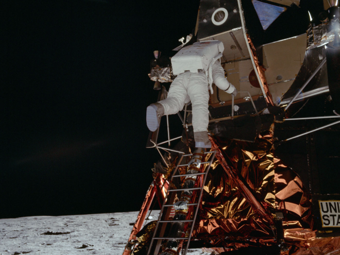 Minutes later, Aldrin got out of the Eagle lander and joined Armstrong on the moon, joking that he was "making sure not to lock it on my way out."