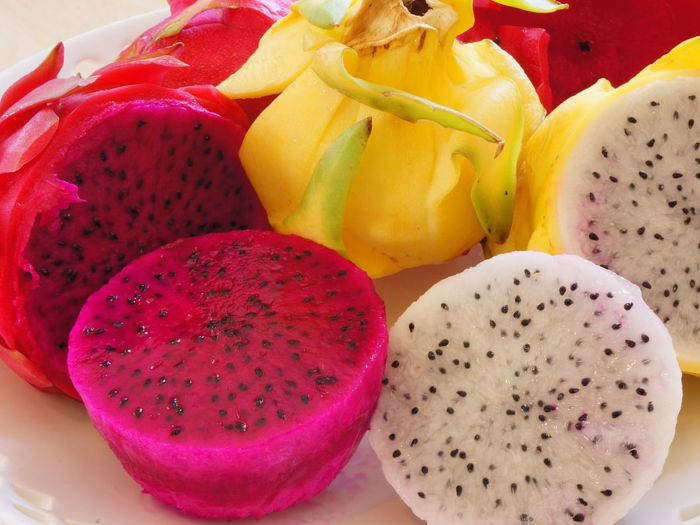  Dragon fruit is notable for its psychedelic appearance. Its texture is reminiscent of kiwi, and its taste is mildly sweet. The pink version is often used to give color to smoothies and other drinks. 