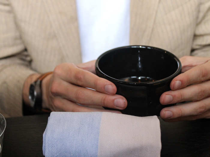 Our experience began with a toasted grain-y broth, filled maybe a quarter of the way in an artisan-looking bowl.