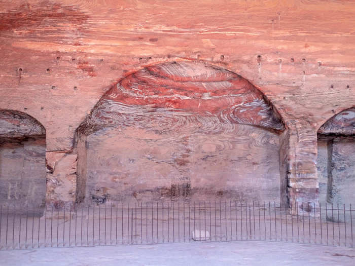 Inside the Urn Tomb are three niches that open to small burial chambers. During the Byzantine period, the tomb was converted to a church. While Petra began to depopulate after the earthquake in 363 C.E., it wasn