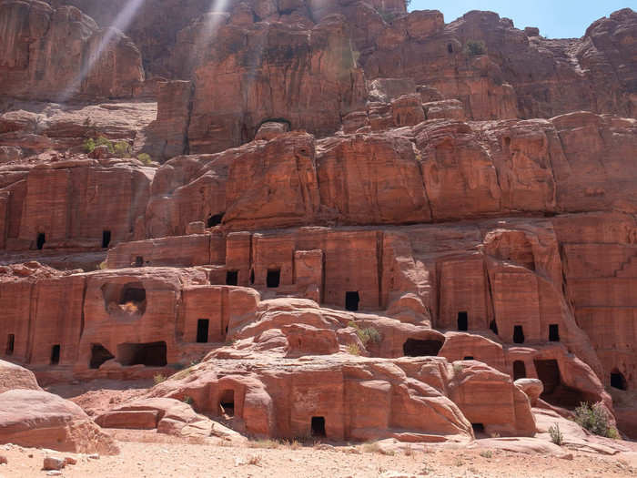  Outside the Siq and the Treasury is what is called the "Street of Facades." On both sides of the area are a cluster of tombs with crow-stepped attics. Some archaeologists believe these tombs held senior officials or princes. 