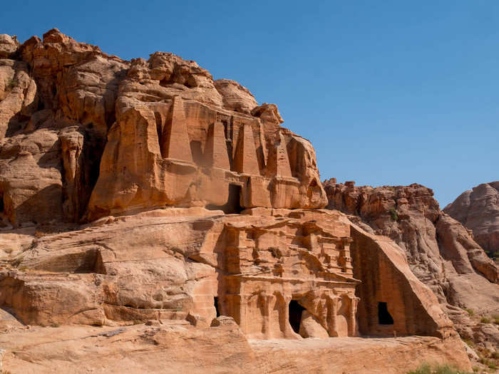 The next structure along the road is the Obelisk Tomb. There are four pyramids above the tomb as well as statues that represent the five people buried there. The bottom floor of the tomb is a banquet hall,  Once a year the family of the deceased came to hold a feast to honor the dead and clean the tomb, Alhasani explained.