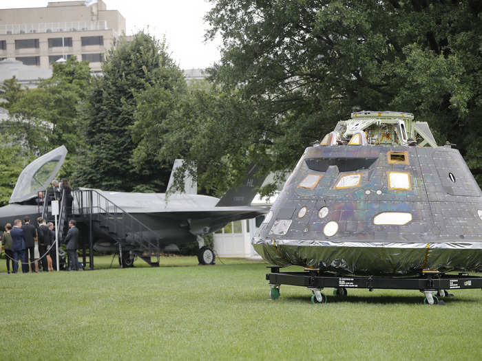 The Orion crew module sits next to a F-35 on the South Lawn of the White House.