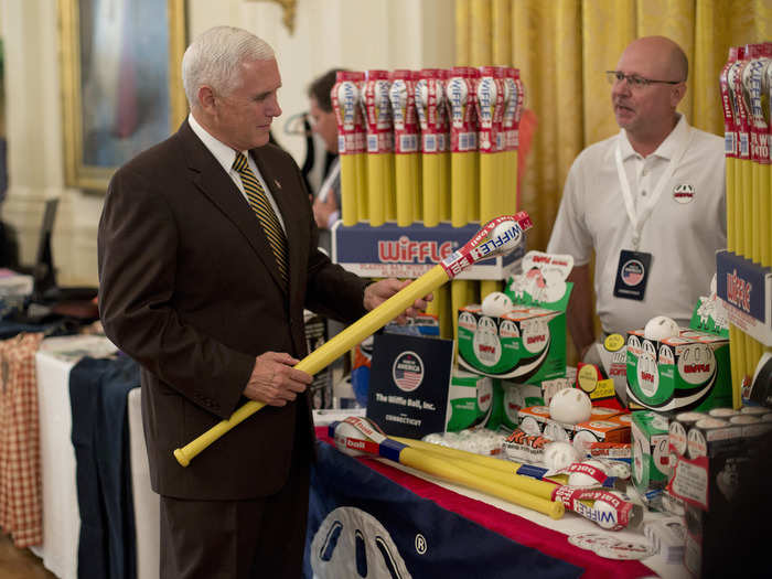 Pence also took a look at a plastic bat from Connecticut-based Wiffle Ball.