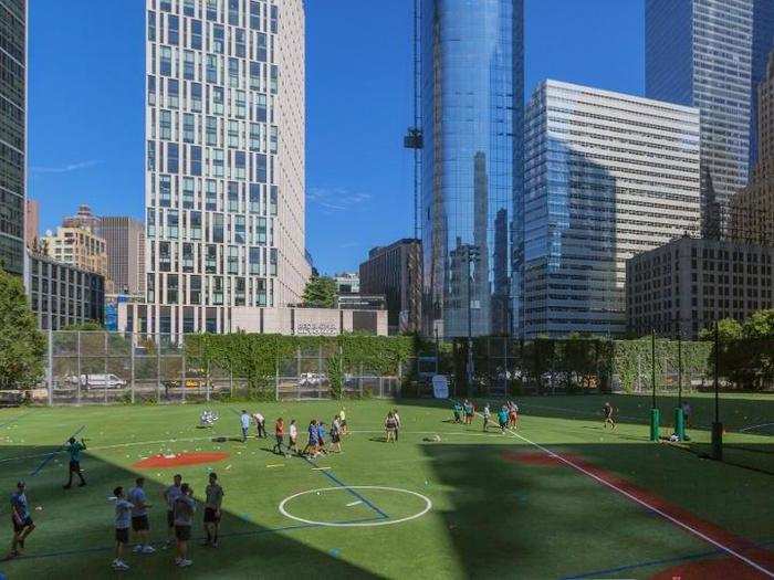 On a ball field nestled among skyscrapers and the West Side highway, Goldman employees enjoyed a day away from the office.