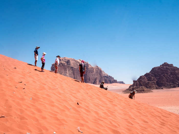 Alhasani encouraged us to take off our shoes, climb up the sand dune along the rocky ridge, and then sprint down. I made the mistake of listening to his advice. Even the rocky ridge was hot enough to scramble eggs.