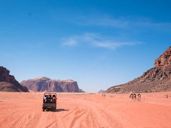 But as soon as we passed onto the sand, all worry was forgotten. As Lawrence wrote, "Our little caravan fell quiet, afraid and ashamed to flaunt its smallness in the presence of the stupendous hills." Well said, old chap.