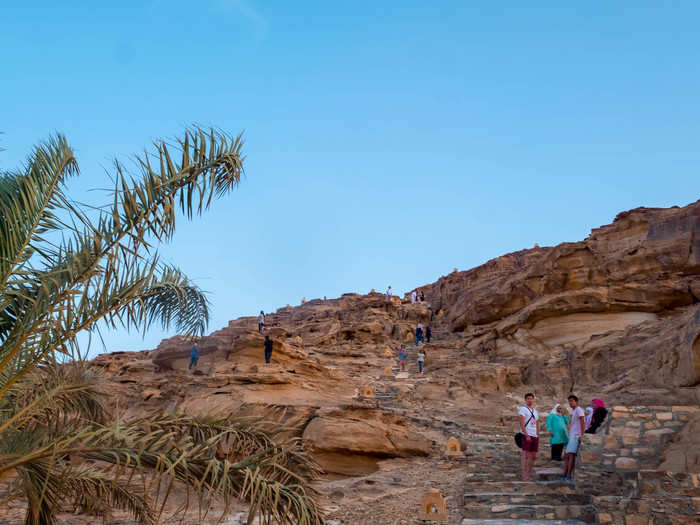 Our guide pointed out a cliffside behind the camp that he suggested would be a good viewpoint to see the landscape during the sunset. It was a short, 10-minute hike up.