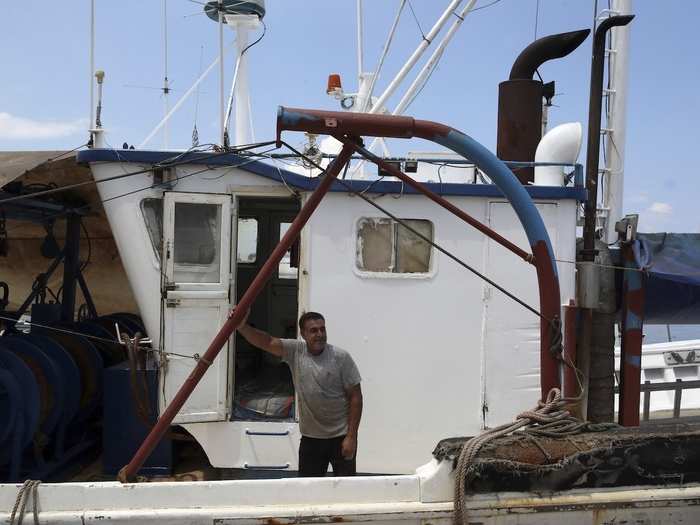 Egyptian Fisherman Tawefik Halil who helped the Greek coast guard pull survivors from the water, said it was a harrowing task.