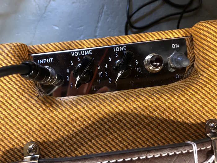 The PJ IV has an old-school tweed cover and two chicken-head knobs: one for volume and one for tone. Inside are tubes and a 10-inch Jensen speaker. The amp goes for about $500.