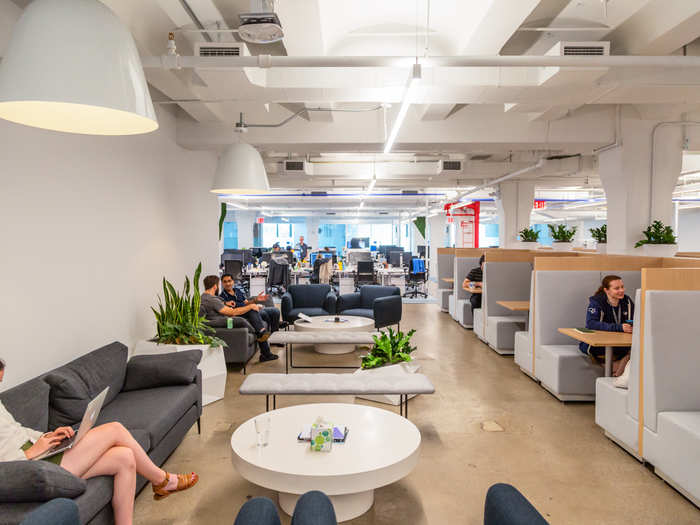 Down on another floor, Flatiron has more desks as well as booths for one-on-one meetings, which are a big part of the company