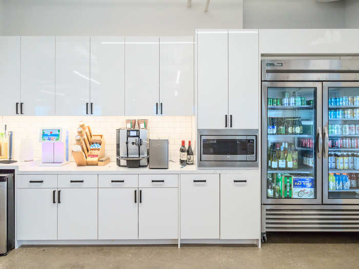 On the opposite side of the floor from the pantry sits what Rosie Hobbs, senior manager of office operations at Flatiron, calls the "Hydration Station," filled with different beverages.