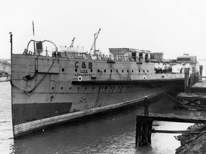 To convert the ship into a carrier, the US stripped off the large wooden superstructure and exhausts.