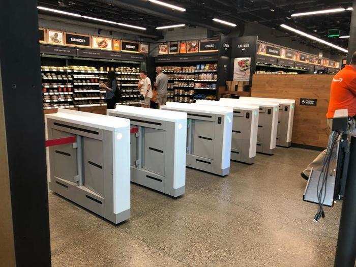 The whole point of Amazon Go is that there are no lines, no cashiers, and no waiting. Those turnstiles you see here are the closest things to cash registers — you scan your phone as you walk in, and that