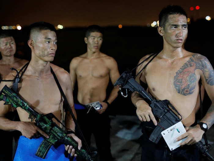 Taiwanese Marine from Underwater Demolition Company, Amphibious Reconnaissance Patrol Unit, take part in a night-time landing training, in Kaohsiung, Taiwan July 23, 2018.