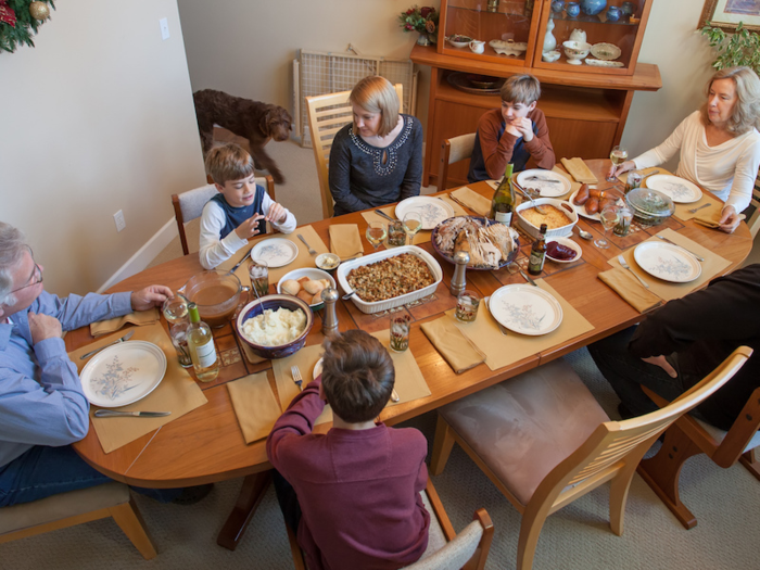 4. Sitting down for family dinner