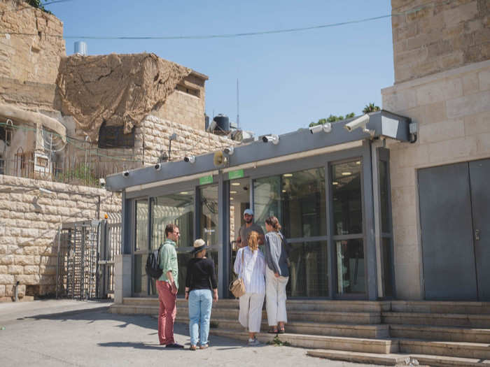 The perspective of Palestinians and Muslims on this history is very different. Mohammed Al-Mohtaseb, a 27-year-old Palestinian tour guide, has experienced the "liberation" of Hebron through the gauntlet of military checkpoints erected across the city, and particularly around the Ibrahimi Mosque, like this one.