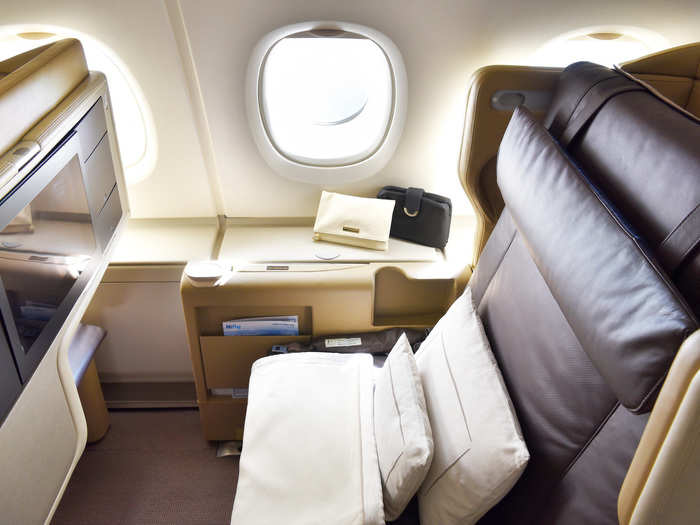 Every business class seat comes equipped with a 15.4" entertainment screen.