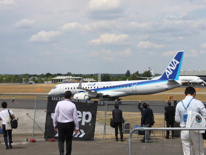 The MRJ also performed a flight demonstration. Here it is waiting its turn on the tarmac.