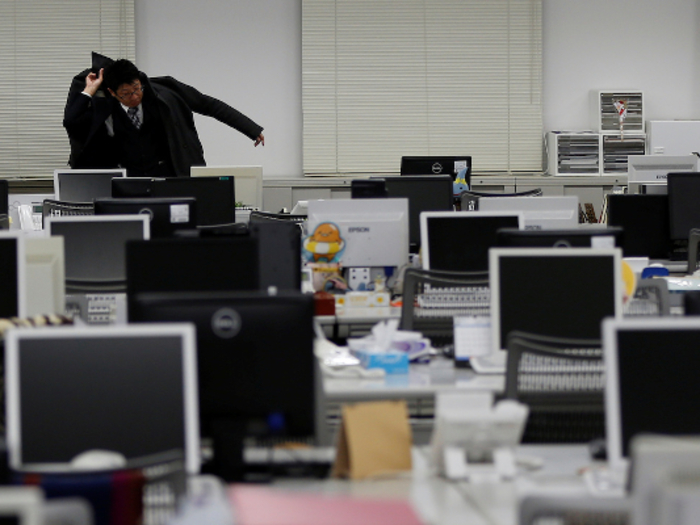 In Japan, hundreds of Japanese workers die every year from "karoshi," or death by overwork. That might involve suicide or simply dropping dead at their desks.