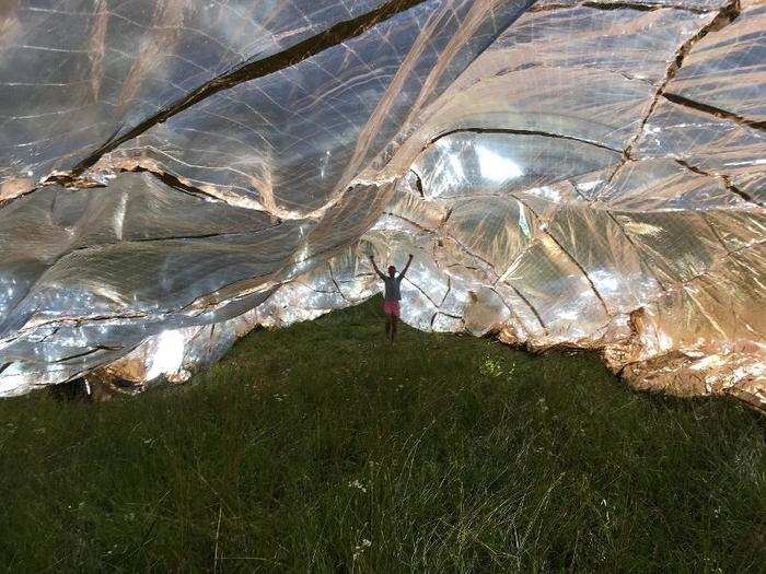 During the day, festival attendees will be able to gather under the blanket to cool down, nap, or dance.