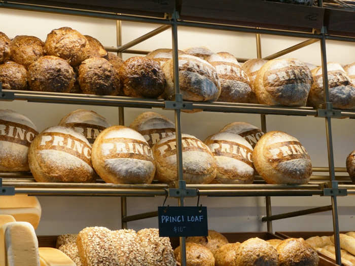 Bread is made fresh daily at a commissary kitchen in SoDo — their branded Princi loaf takes 48 hours to proof, according to the manager.