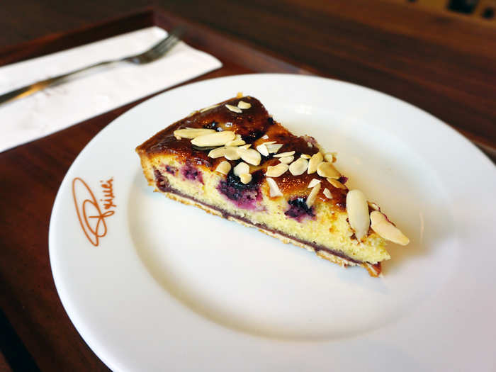 Desserts are served with care on branded plates and wooden platters. This frangipane ai frutti di bosco (a dessert with an almond filling and berries) will run you $8.50, though pastries like cinnamon rolls are only $3.75.